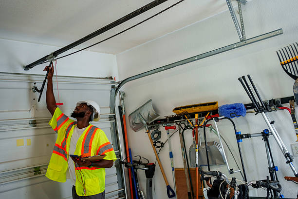 Professional Garage Door Panel Replacement technician working in Madison County County, TN